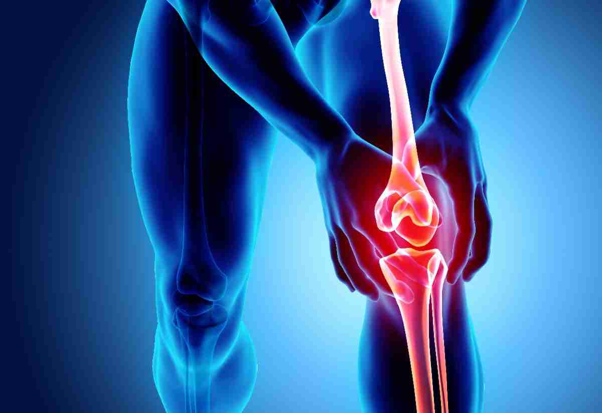 Joint Health depicted by a man or woman holding their knee cap