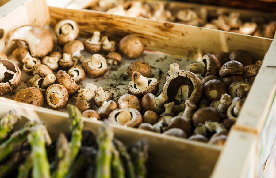 fresh-mushrooms-wooden-tray-farmers-market_23-2148209825