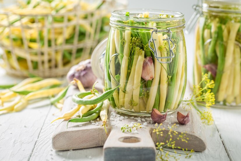 homemade-canned-yellow-green-beans-jar-with-herbs_681987-8061