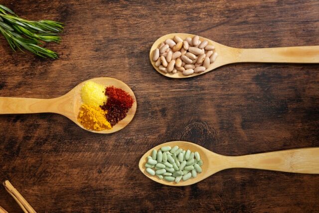 flat-lay-spoons-with-spices-beans