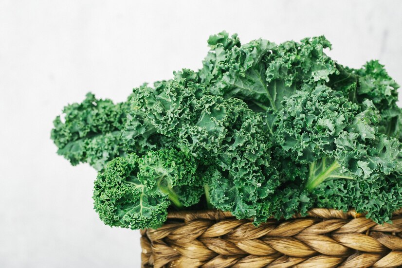 curly-raw-green-leaves-kale-cabbage-wicker-box-horizontally-health-content-selective-focus