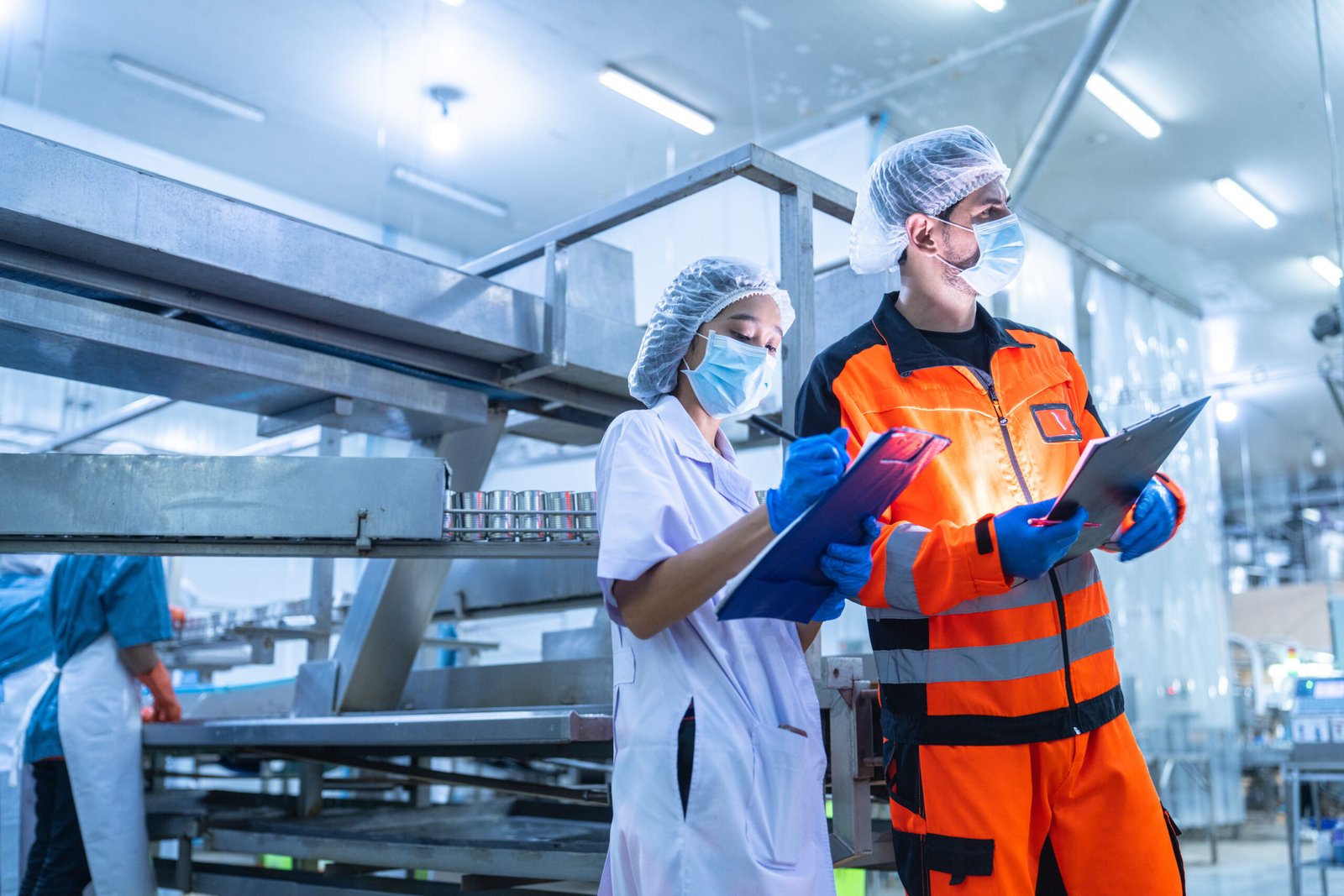 Food and manufacturing researchers oversee seafood production li Food and manufacturing researchers oversee seafood production lines in tightly controlled factories where machinery is used to produce and cook food before it is shipped out.